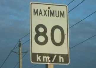 speed sign showing 80 km/hr