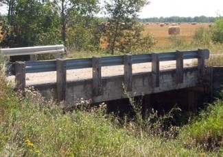 wooden bridge over a stream